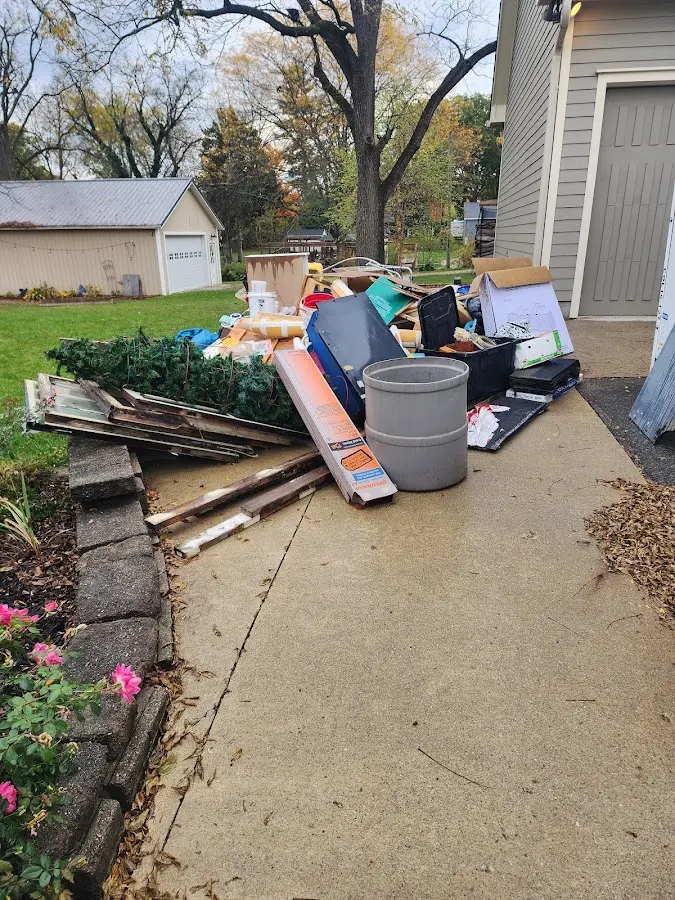 Dumpster being loaded with debris for 3 Yard Dumpster Rental in Peach Bottom